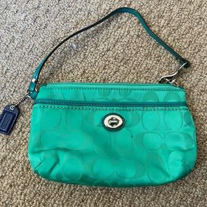 Green Coach fabric wristlet